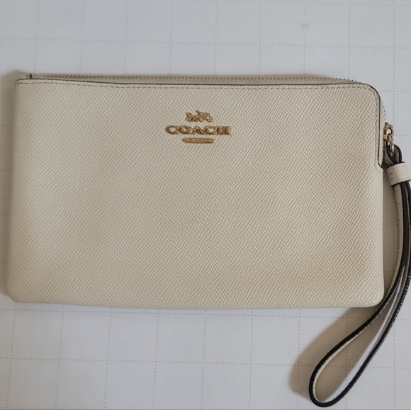 Coach Handbags - Authentic Cream Color Coach Wristlet
